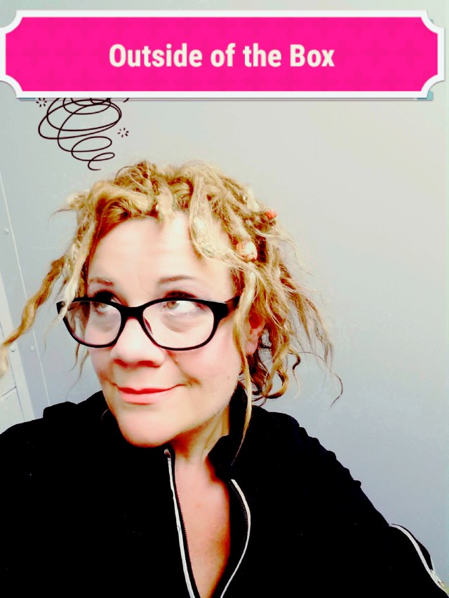 Fun Photo of Angie Mack Reilly with a bubble above her head that says "Out of the Box"